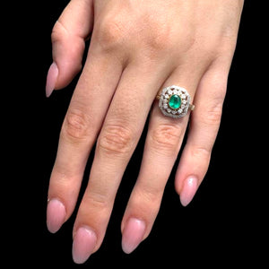 Emerald and diamond gold ring