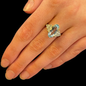 Blue topaz diamond ring