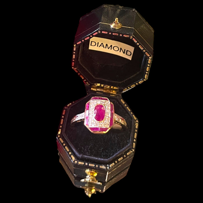 Ruby and diamond gold ring.
